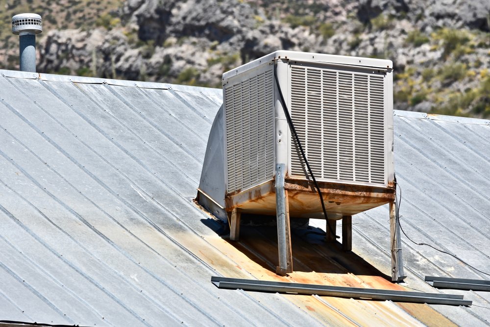 Rooftop swamp cooler replaced with a new central AC condenser